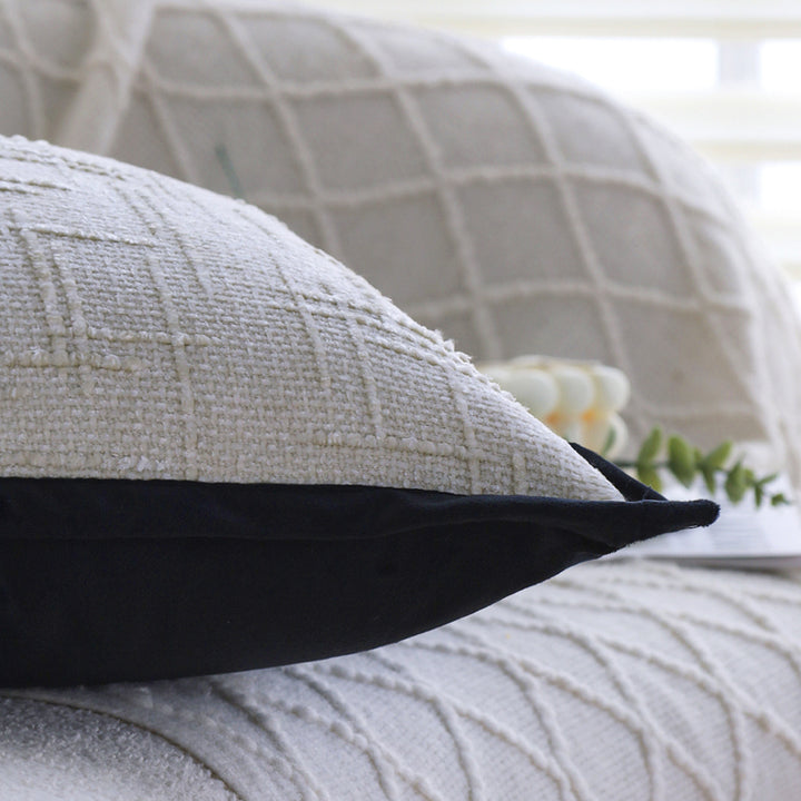 Square decorative cushion cover with structured grid tufting and contrasting piping Stornfield