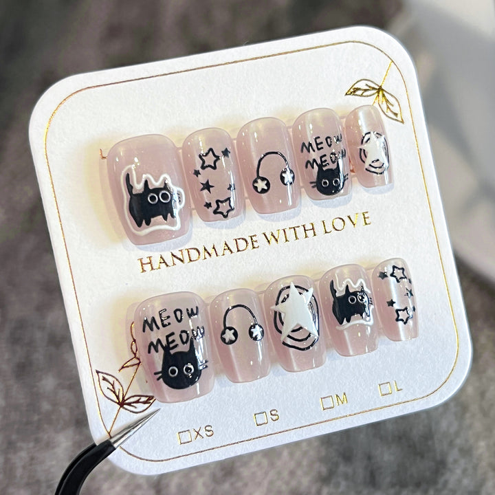 Artificial nail art with cat designs Stornfield