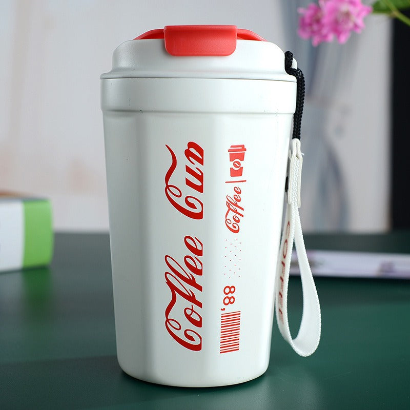 Women's insulated coffee cup with practical carrying device Stornfield