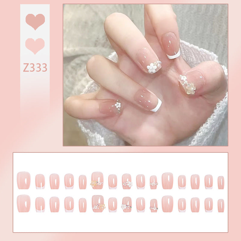 Nail set with elegant flower appliqués and exquisite glitter embellishments Stornfield