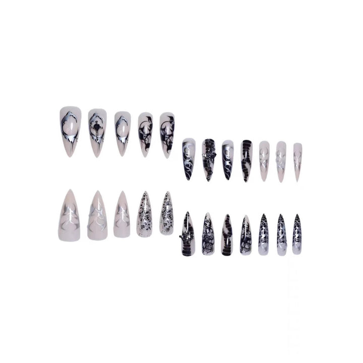 Artistic Stiletto Nail Enhancements with Intricate Patterns Stornfield