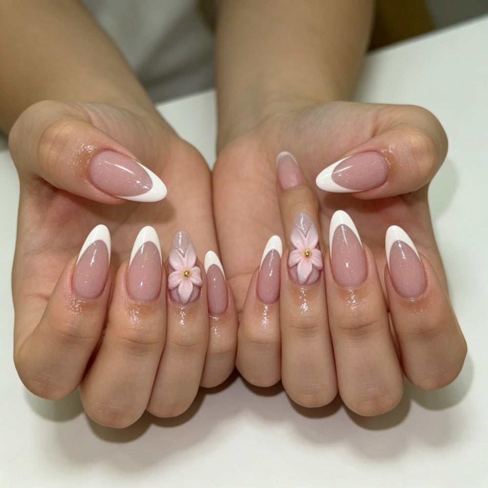 Artificial nails with floral decoration and elegant French tip design Stornfield