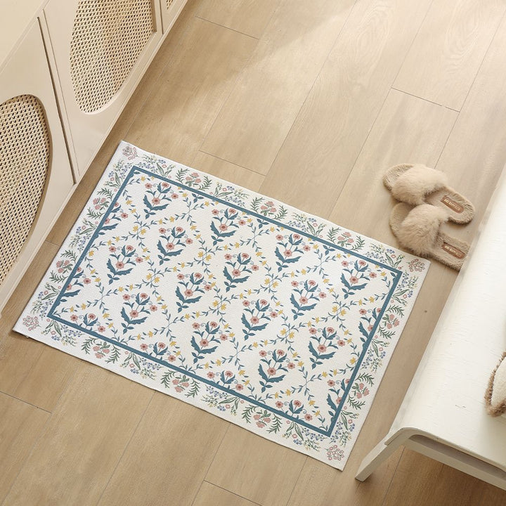 Woven cotton bath mat with floral allover jacquard pattern Stornfield