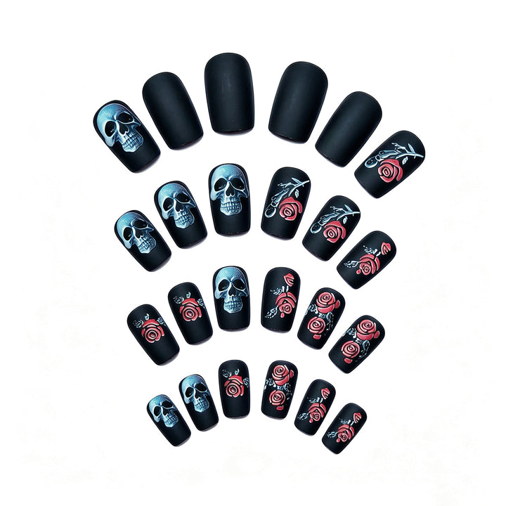 Creative nail art with skull and rose designs Stornfield