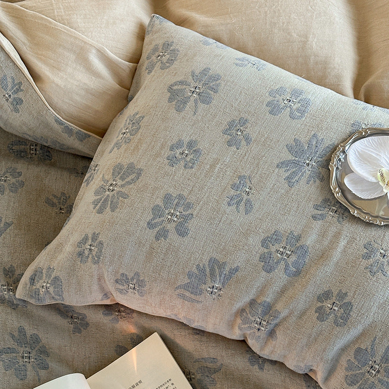 Lightweight cotton muslin bedding set with vintage floral pattern and reversible design