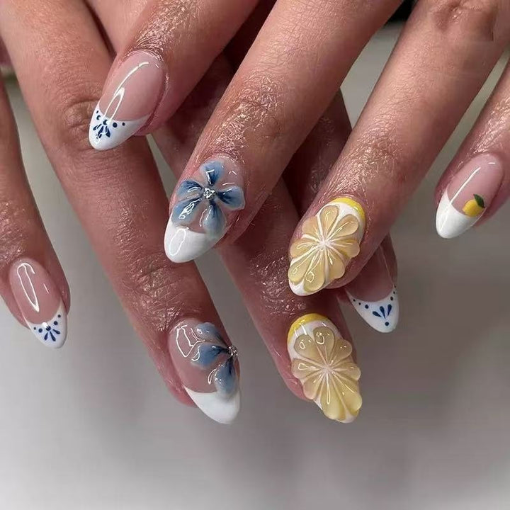 Artistic artificial nails with floral and fruity accents Stornfield
