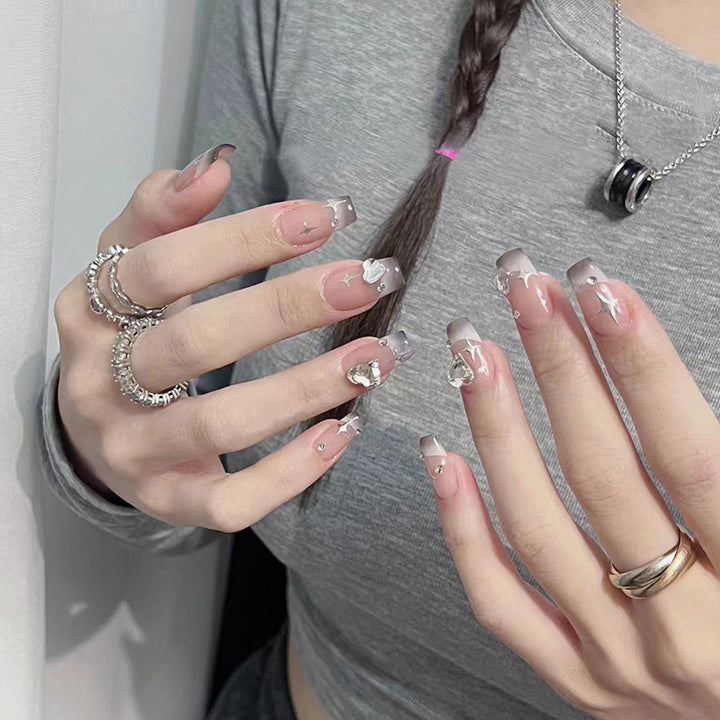 Acrylic nail set with sparkling crystal decorations Stornfield