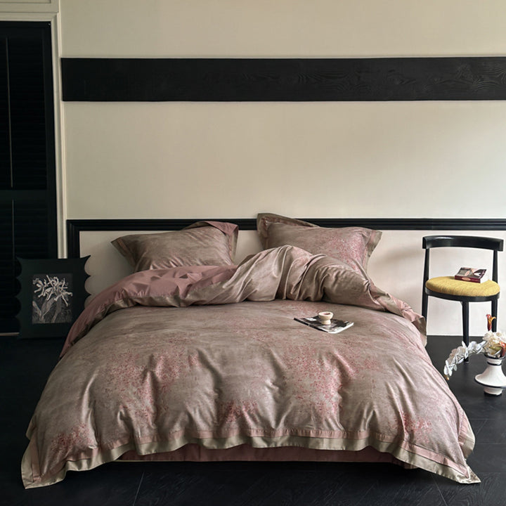 Reversible bedding set made of cotton satin with floral jacquard look and decorative hem
