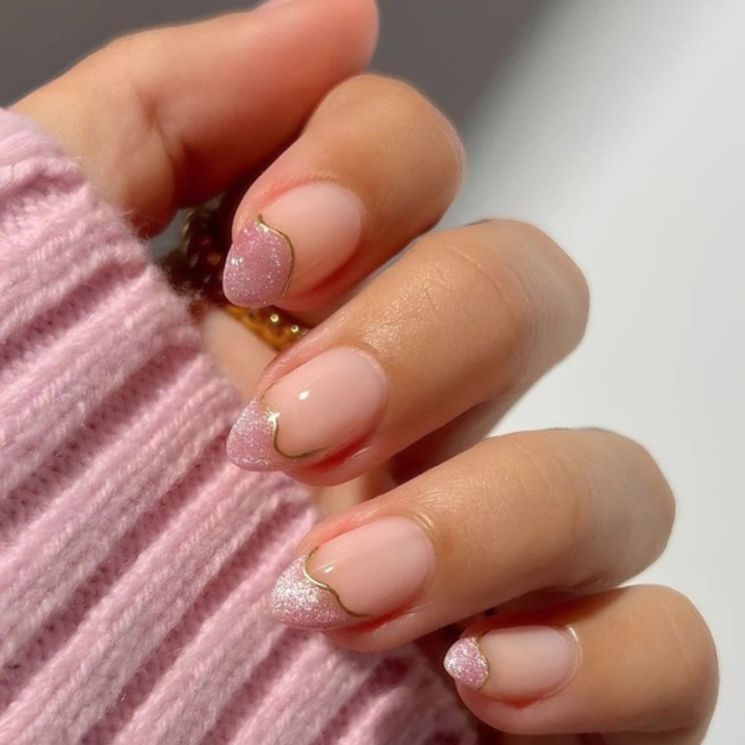 Artificial nail art with playful dots and bows Stornfield