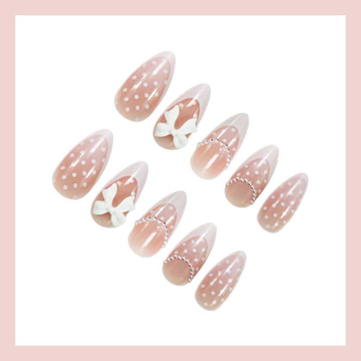 Artificial nail set with elegant tips and playful accents Stornfield