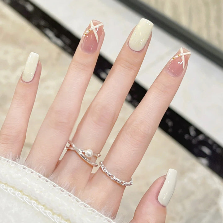 Acrylic nail set with elegant and playful design Stornfield