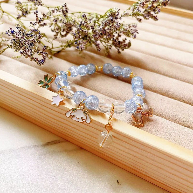 Elegant bracelet with animal and glitter pendants Stornfield