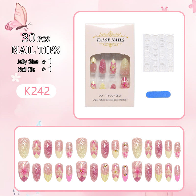 Artificial nail set with floral 3D decorations Stornfield