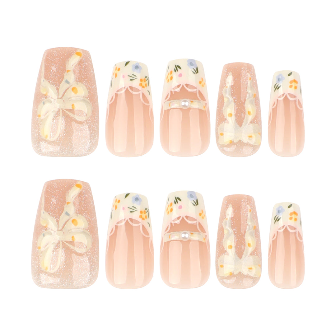 Artful Nail Extensions with Floral Design and Bow Accents Stornfield