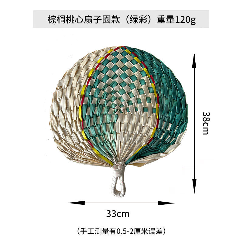 Women hand-woven fan made of natural material Stornfield