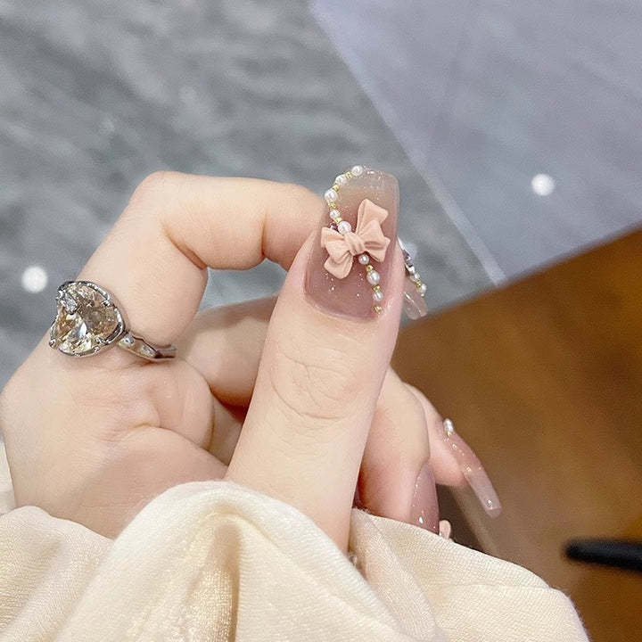 Glamorous artificial nails with moon and star motif Stornfield