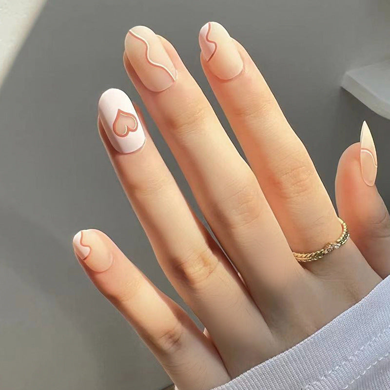 Artful Nail Extensions with Elegant Heart Design Stornfield