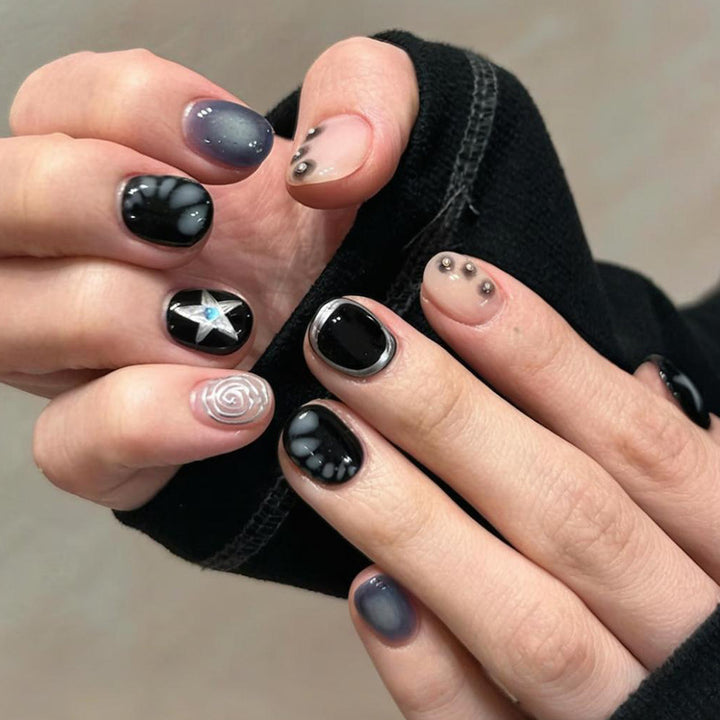 Artificial nail set with creative star and glitter designs Stornfield