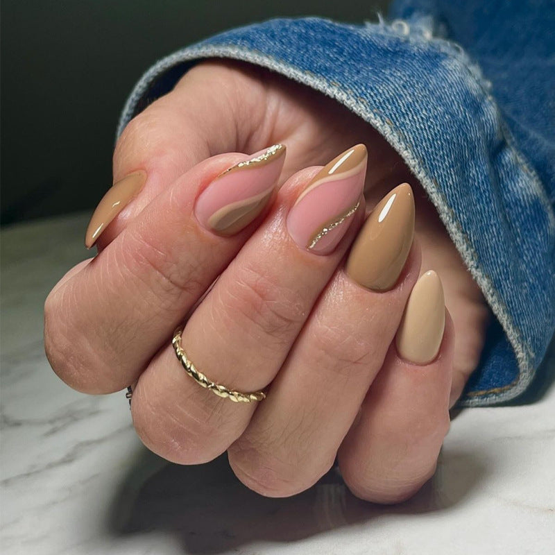 Artistic Almond-Shaped Press-On Nails with Elegant Gold Accents Stornfield