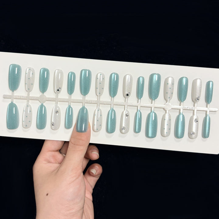 Artistic Press-On Nail Design with 3D Accents Stornfield