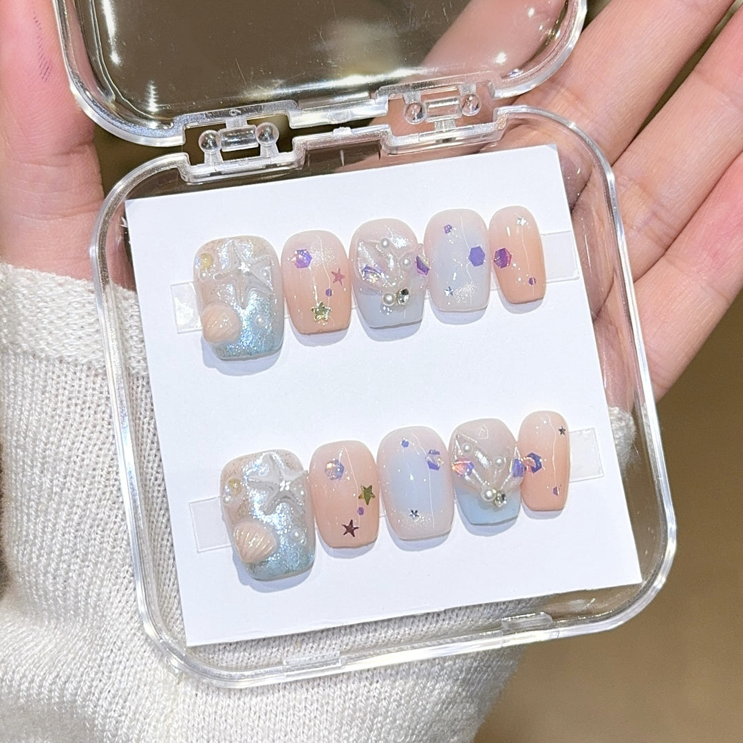 Artificial nails with sparkling galaxy design Stornfield