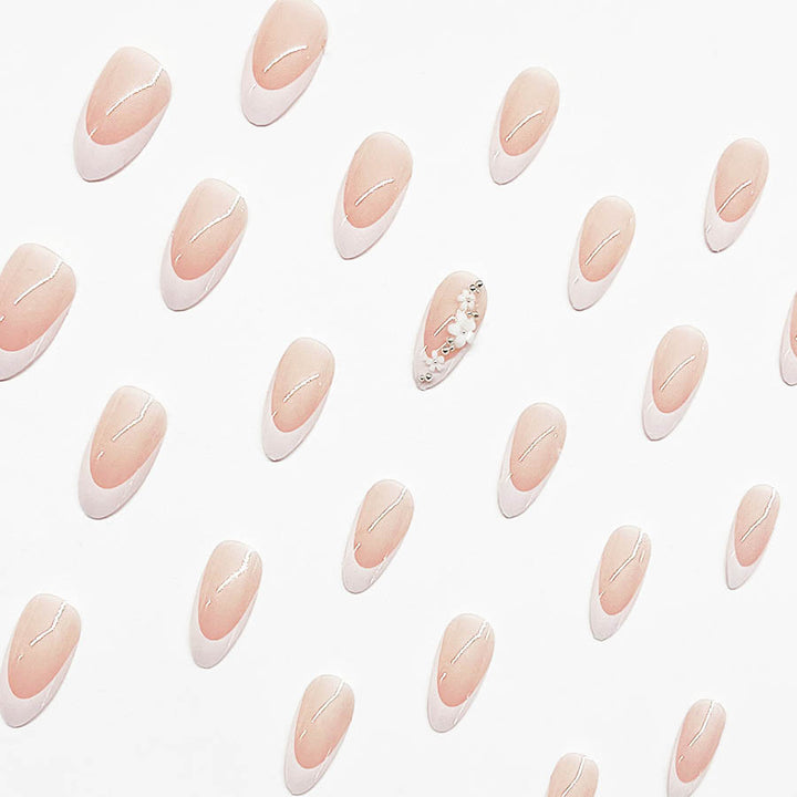 Acrylic Nail Set with Filigree Flower Decorations and Elegant French Design Stornfield