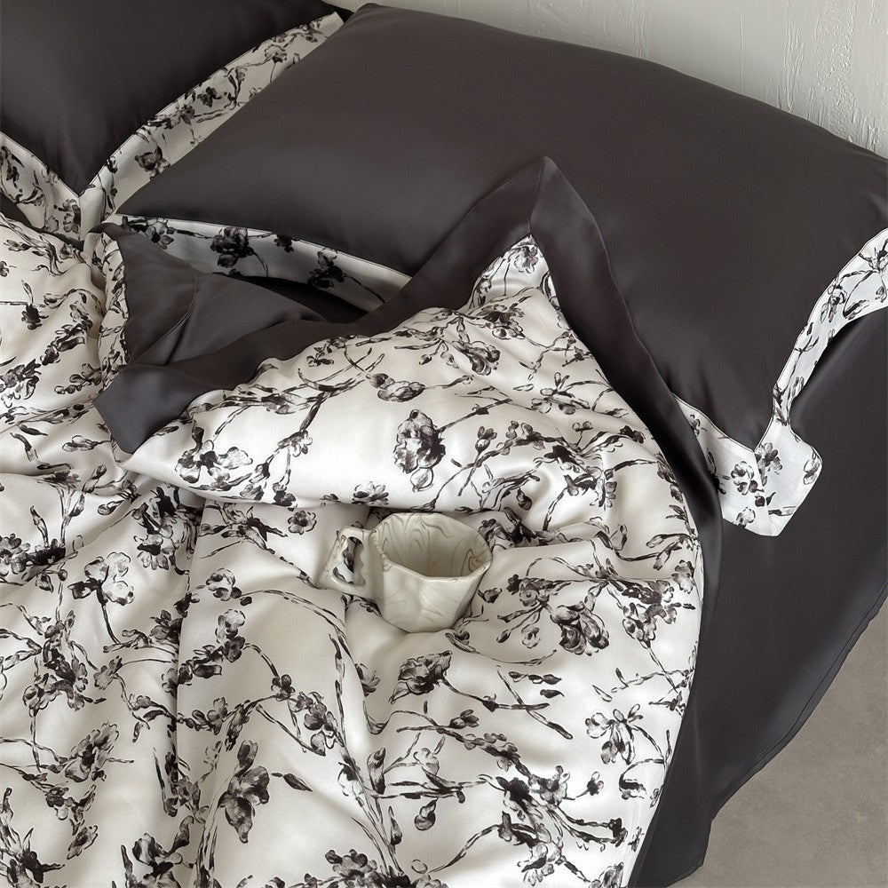 Luxurious satin bedding set with floral watercolor print and satin edge