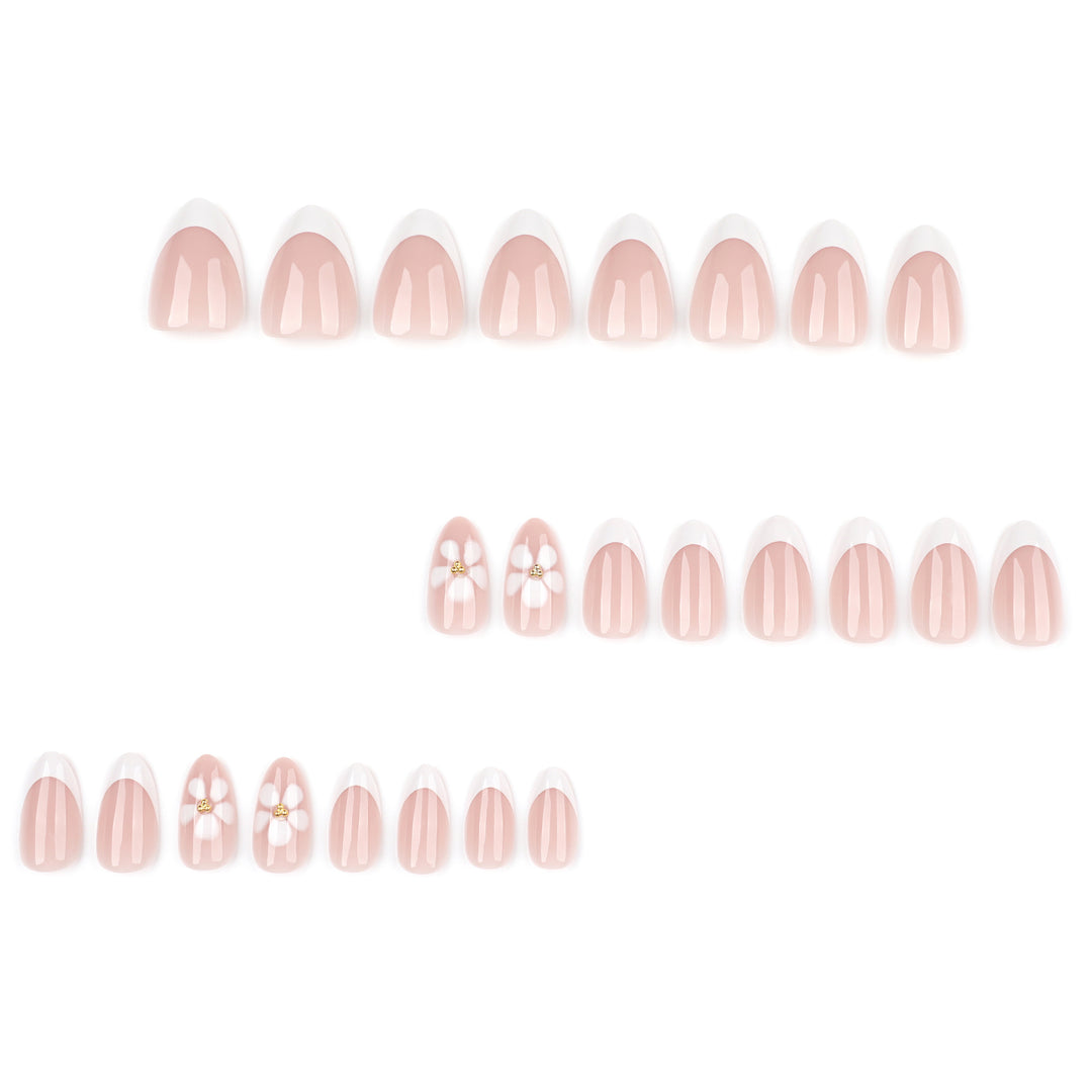 Artful nail extensions with flower design and elegant French tips Stornfield