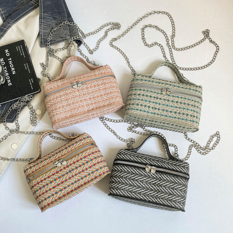 Textured Woven Handheld Clutch