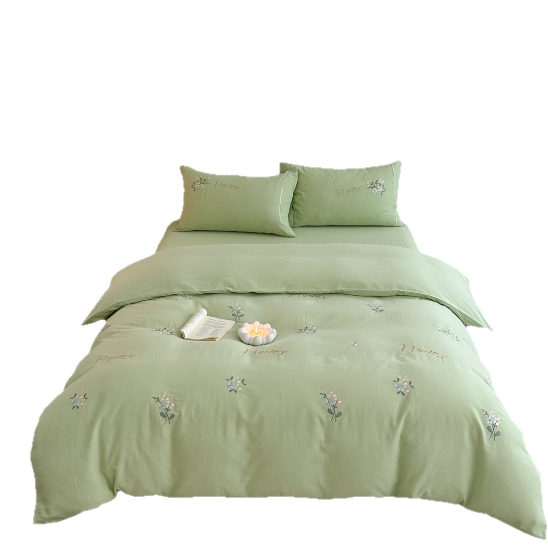 Delicate embroidered cotton bedding set with gentle botanical embroidery and bow ties Stornfield