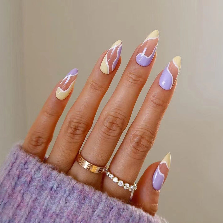Artful Nail Extensions with Wave Design and Colorful Accents Stornfield