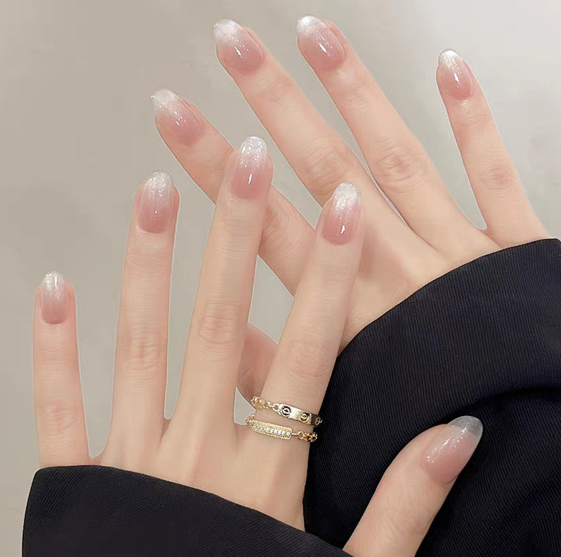 Artificial nails with elegant ombre effect and glitter accents Stornfield