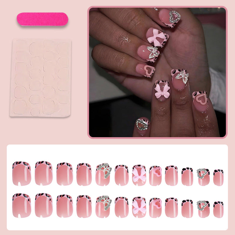 Artificial nail art with embellishments Stornfield