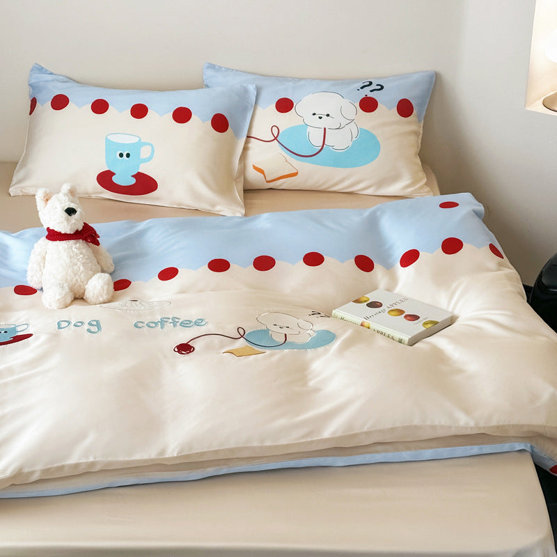 Reversible cotton bedding set with cute dog motif and polka dot border