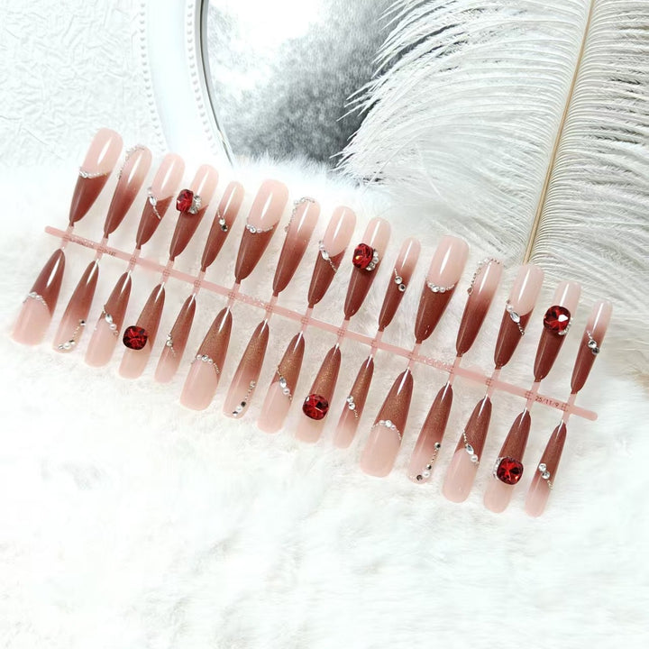 Artificial nails with luxurious 3D decorations and glamorous accents Stornfield