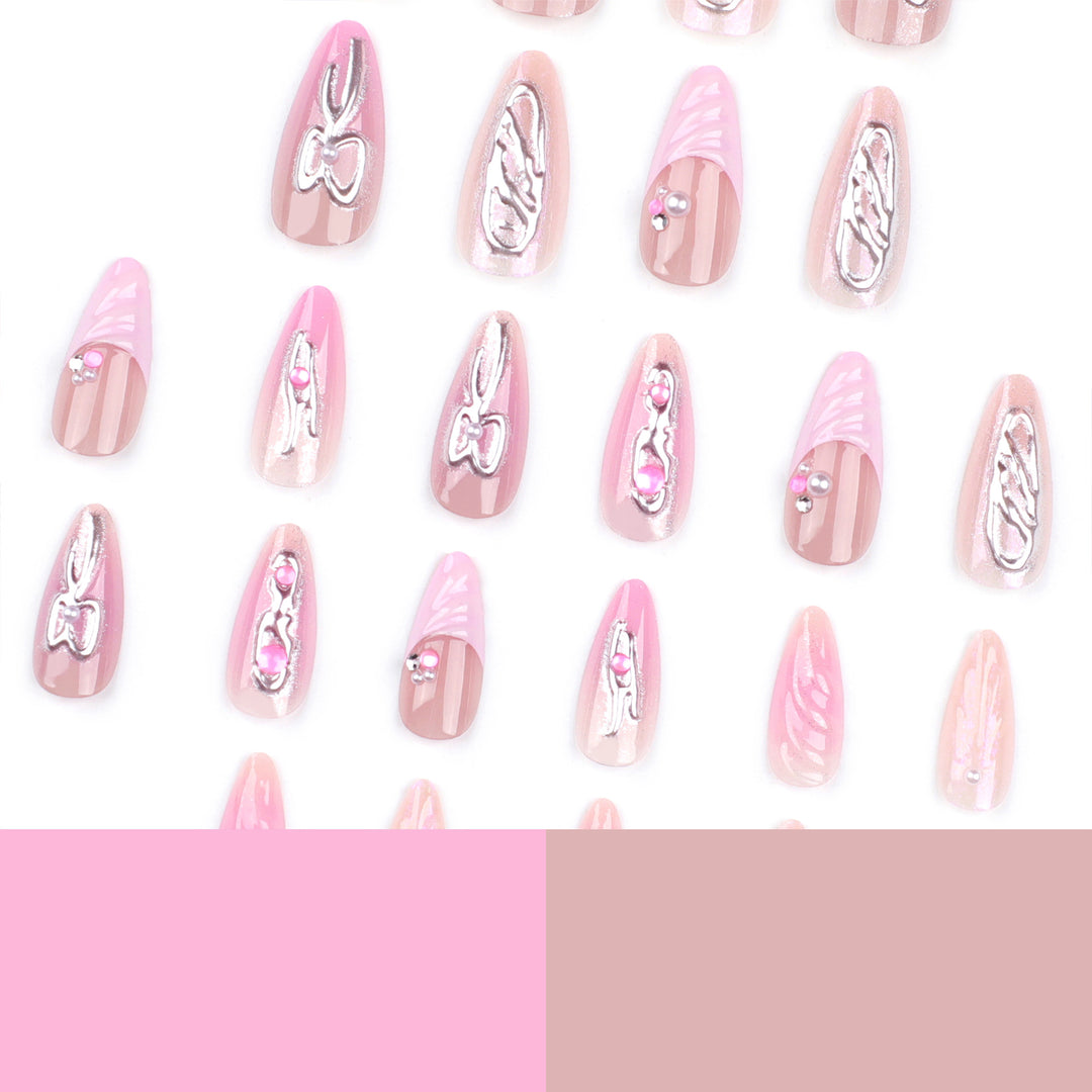 Artful stiletto nails with glitter and pearl decorations Stornfield
