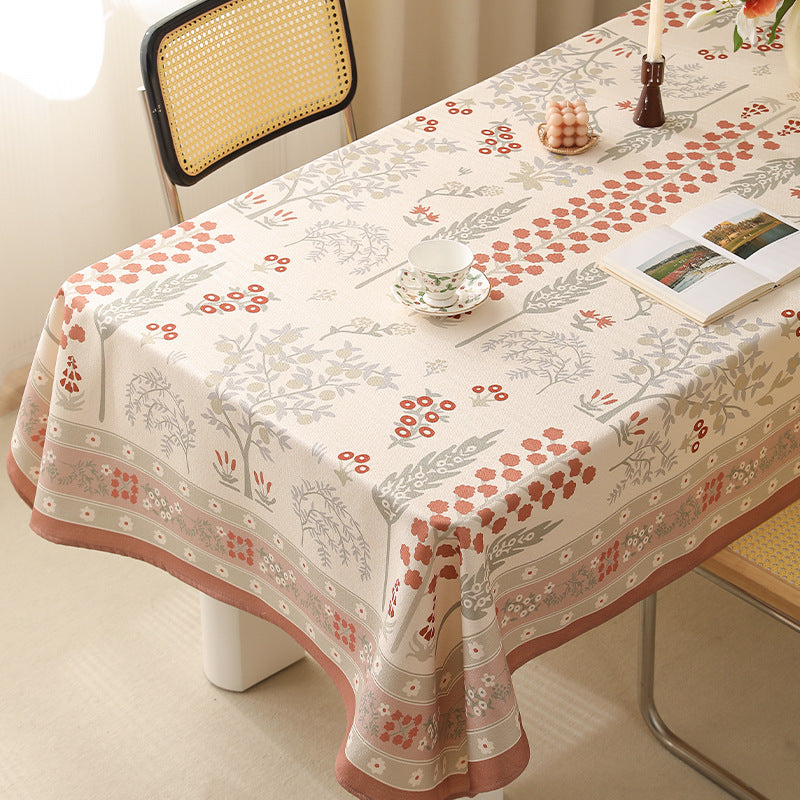 Rectangular easy-care tablecloth in floral jacquard with decorative border Stornfield