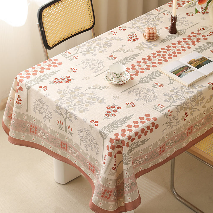 Rectangular easy-care tablecloth in floral jacquard with decorative border Stornfield