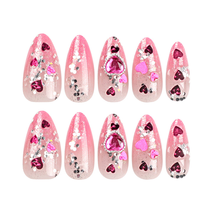 Artful nail art with playful heart designs and glitter Stornfield