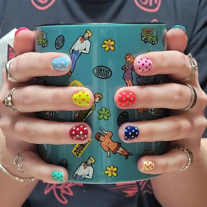 Artificial nail set with colorful dots and cheerful designs Stornfield