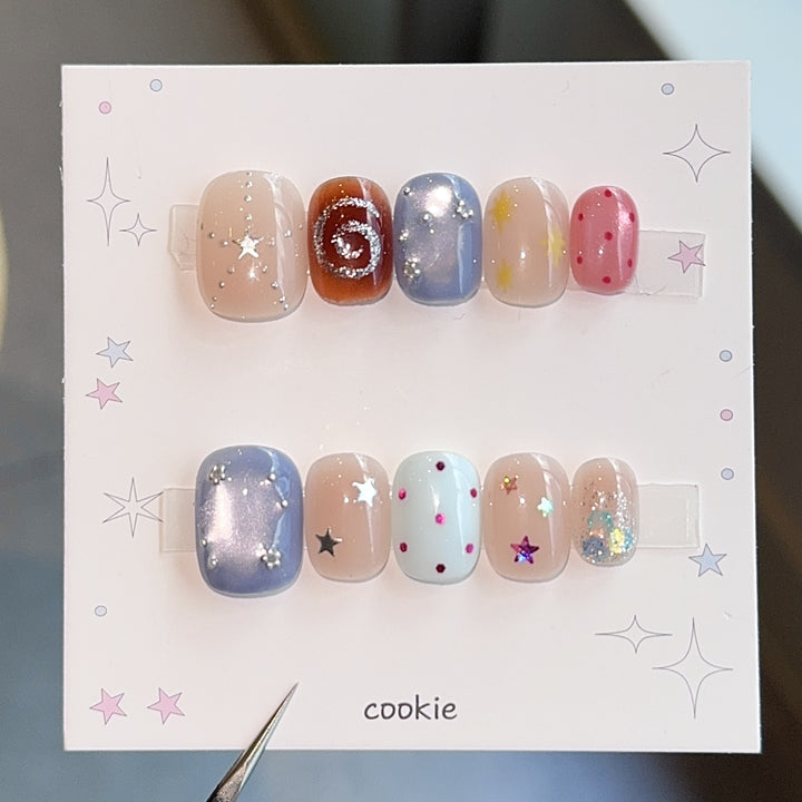 Creative artificial nails with sparkling star patterns Stornfield