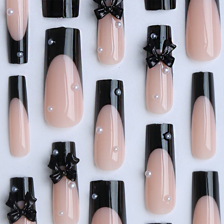 Artificial nails with 3D bow decoration Stornfield