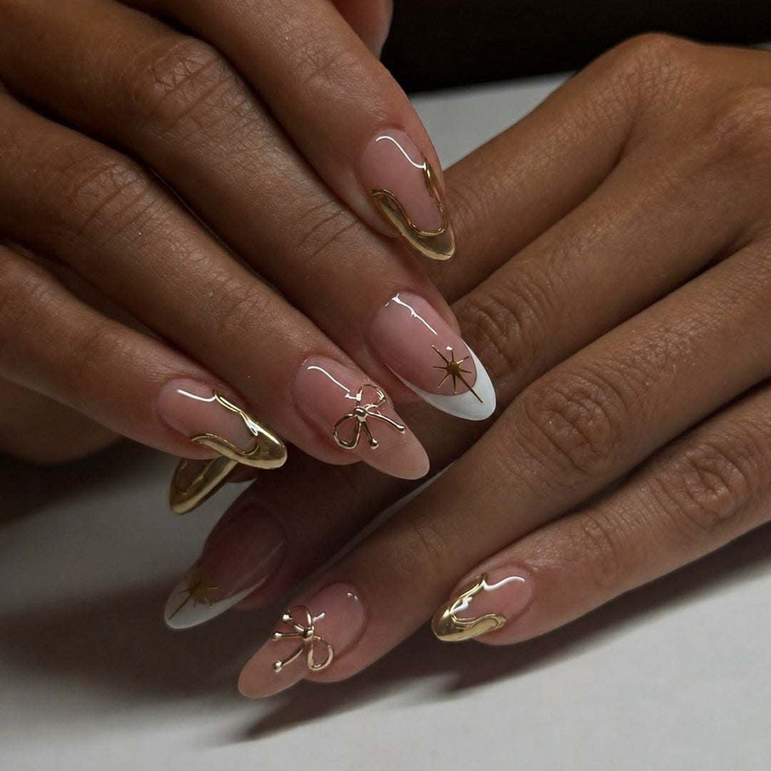 Artificial nail set with glamorous 3D details and elegant gold accents Stornfield