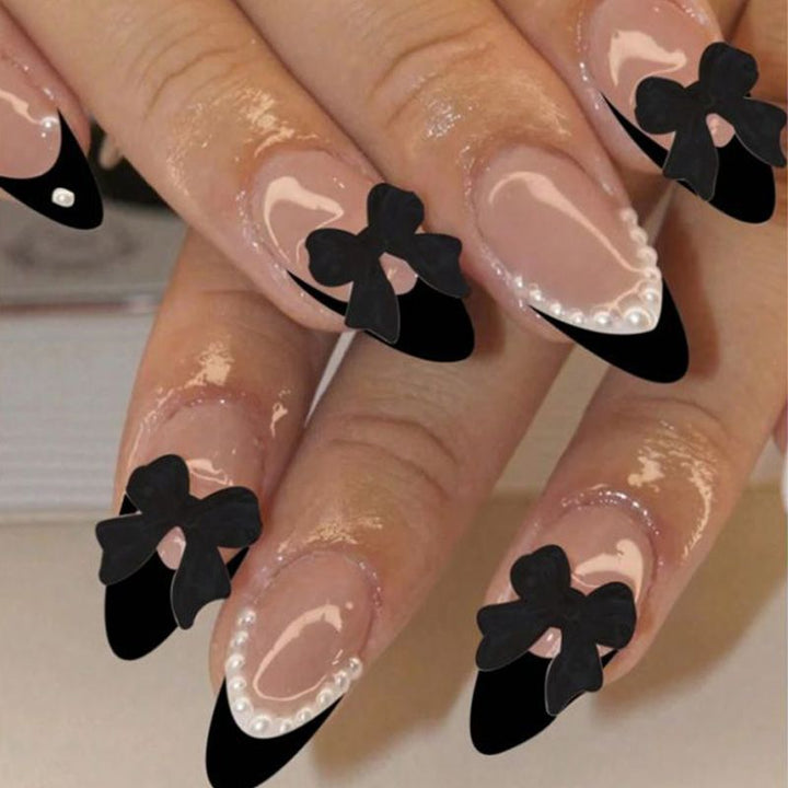 Acrylic Nail Set with Elegant Bows and Glamorous Accent Stornfield