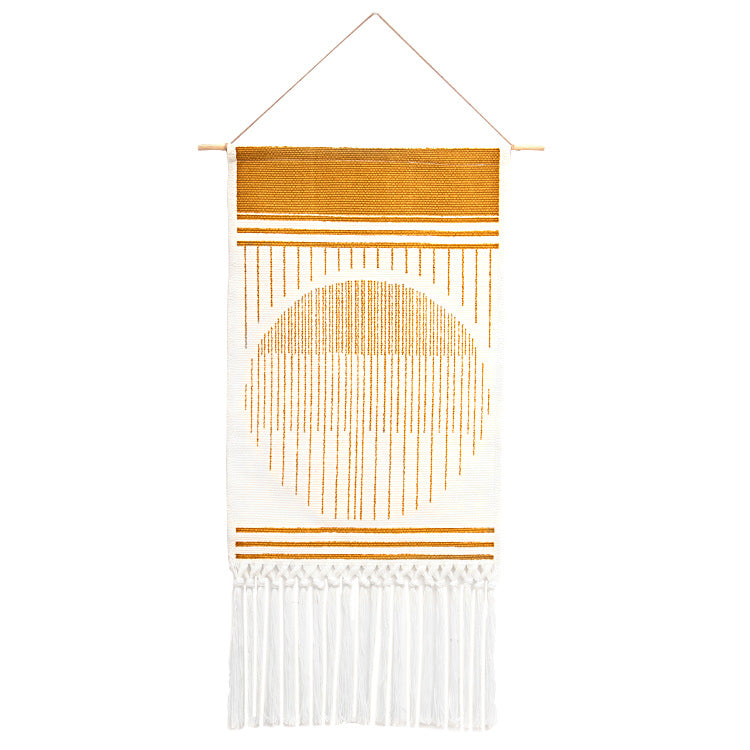 Handcrafted cotton tapestry wall decoration with macrame fringes and geometric circle motif