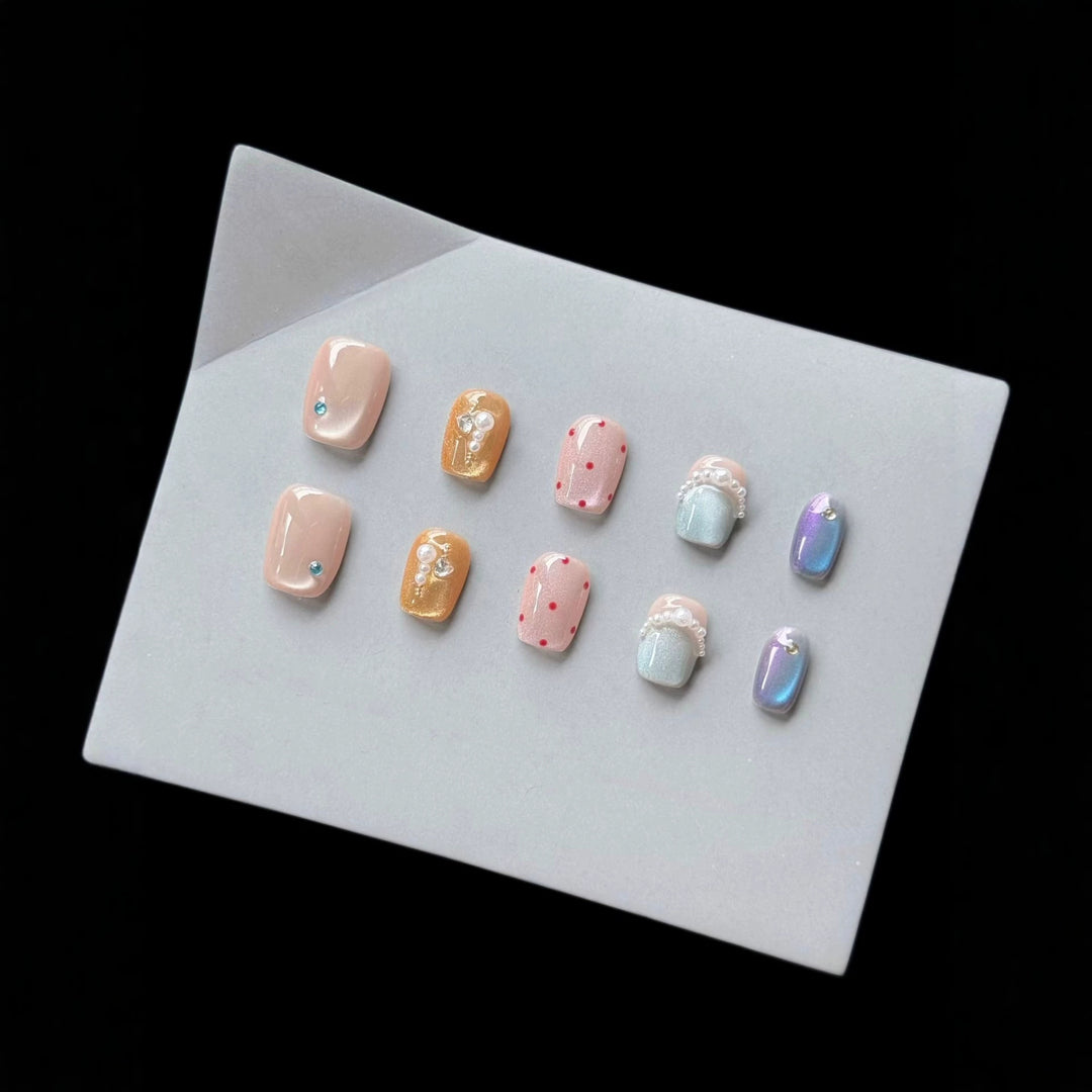 Decorative Press-On Nail Art Set with Unique Gem and Pearl Accents