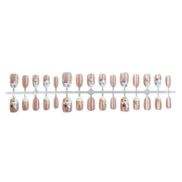 Creative nail art set with cute animal motifs and glitter accents Stornfield