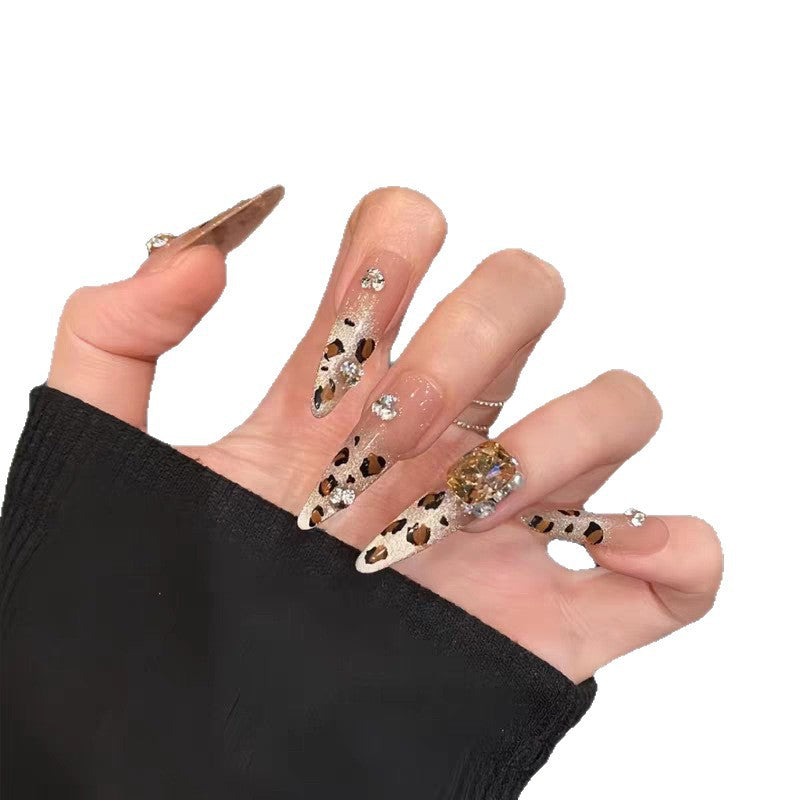 Artificial nails with glamorous glitter accents and leopard print Stornfield