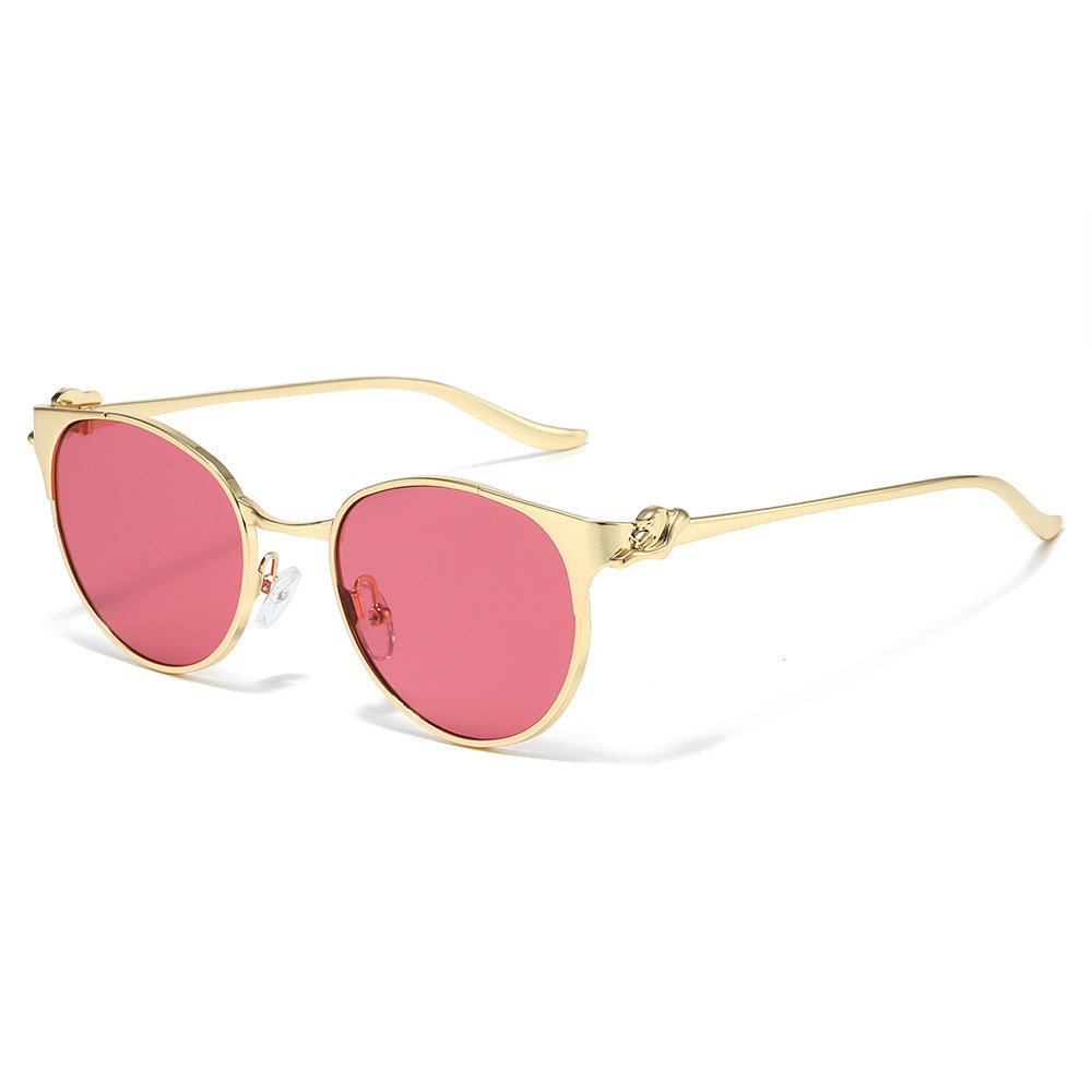 Elegant Cat-Eye Sunglasses with Decorative Gold Accents Stornfield