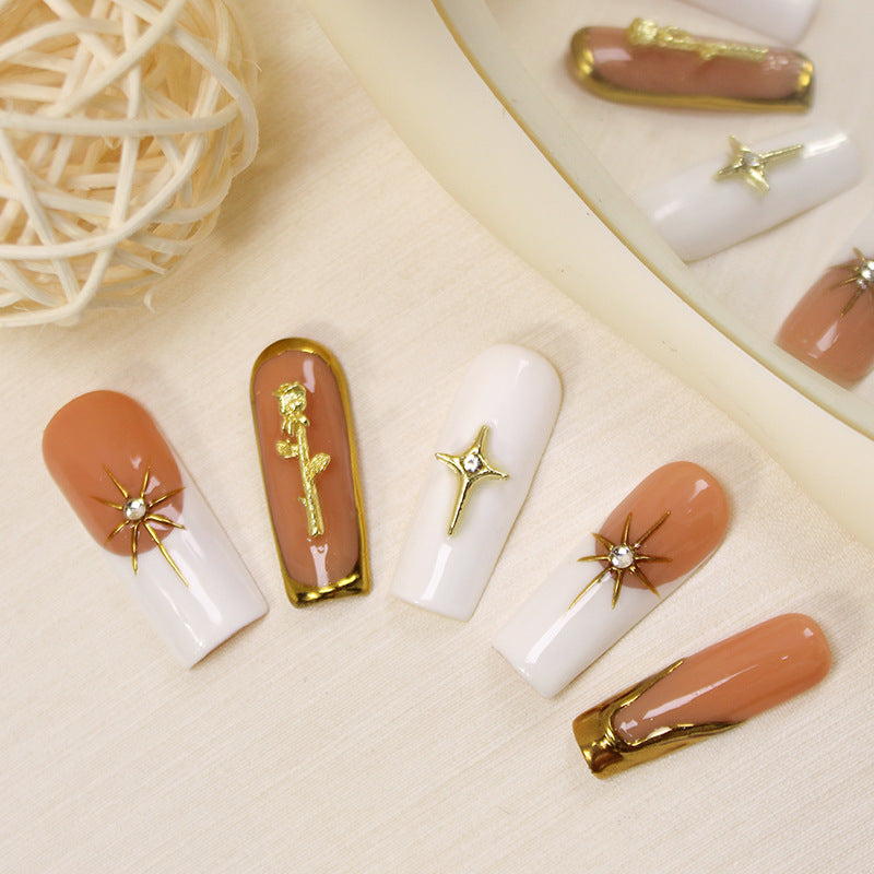Art nail set with romantic flower and glamour accents Stornfield